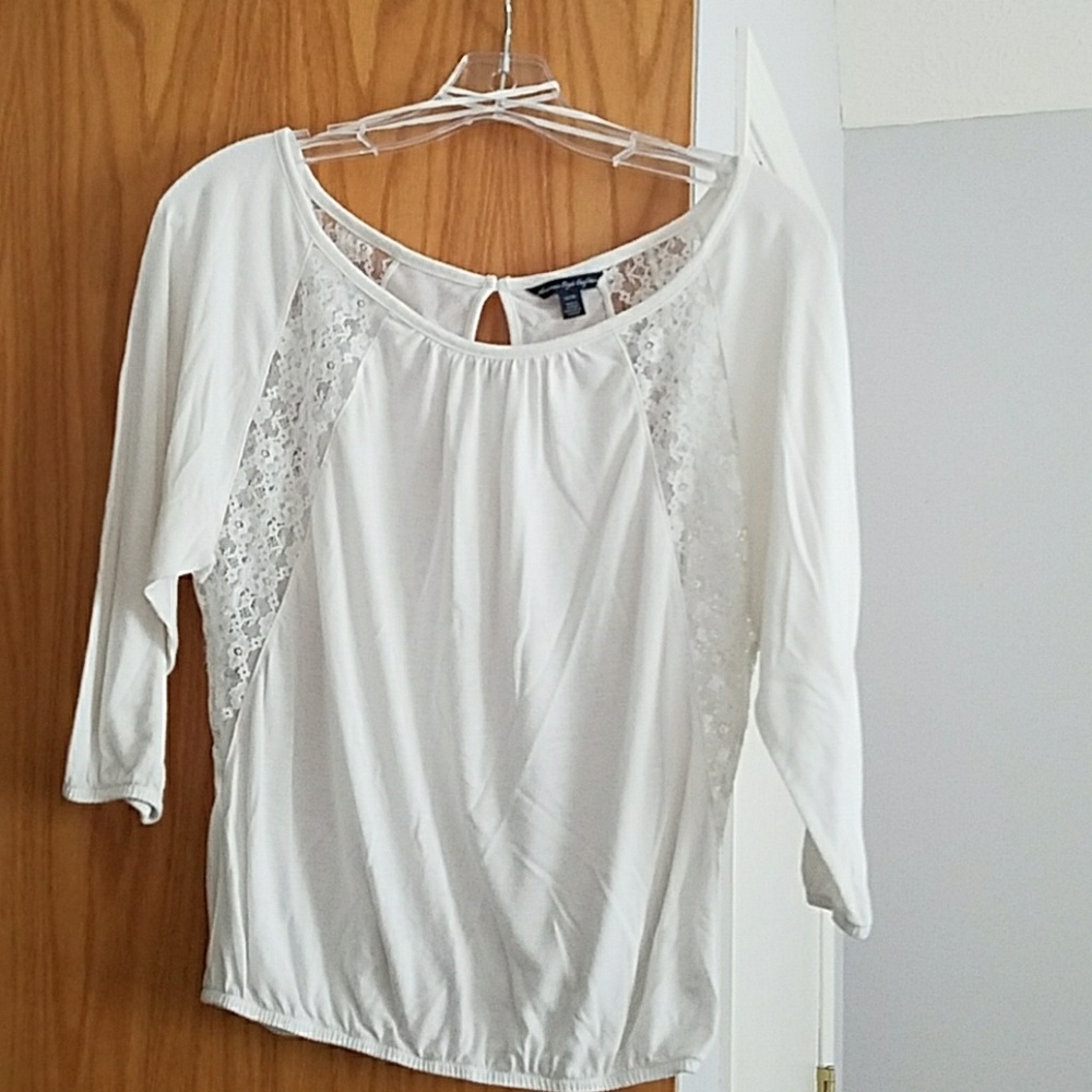 Top with 3/4 sleeves with lace accents